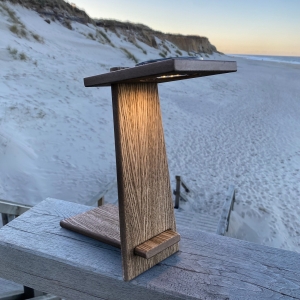 Herforder Tischler machen auch mit gefärbten Solarleuchten auf Meeresverschmutzung aufmerksam